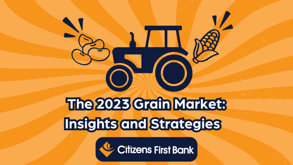 A tractor with grain displayed next to it. The Citizens First Bank logo is displayed below.